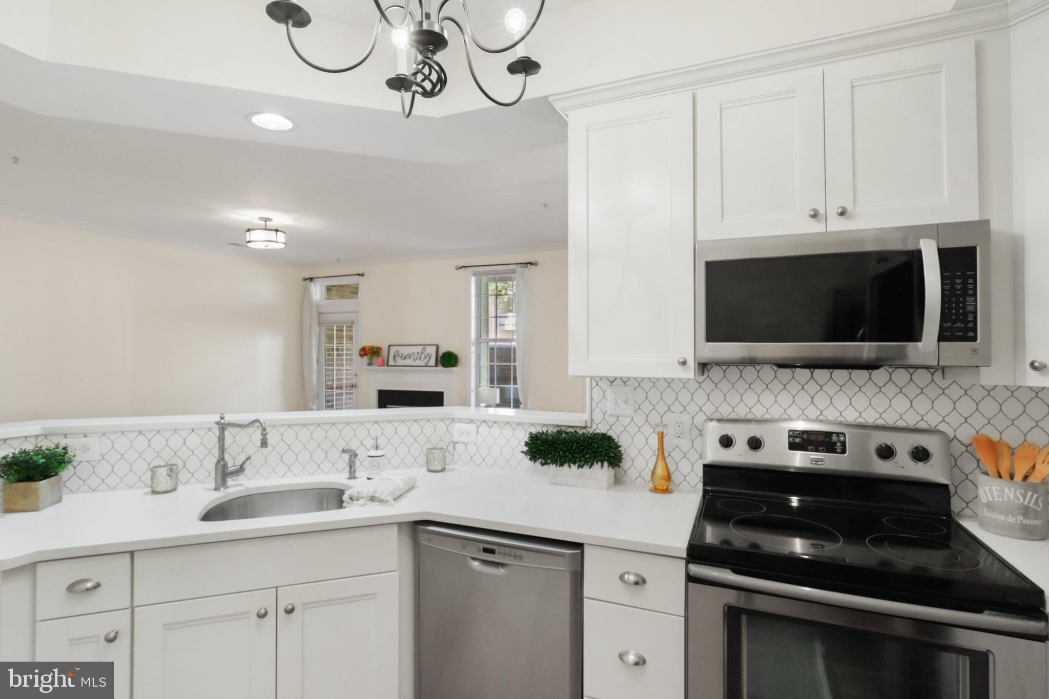 11313 Sundial Court, Unit 208 Reston, VA 20194 - Photo 12 of 30 Updated lighting and backsplash