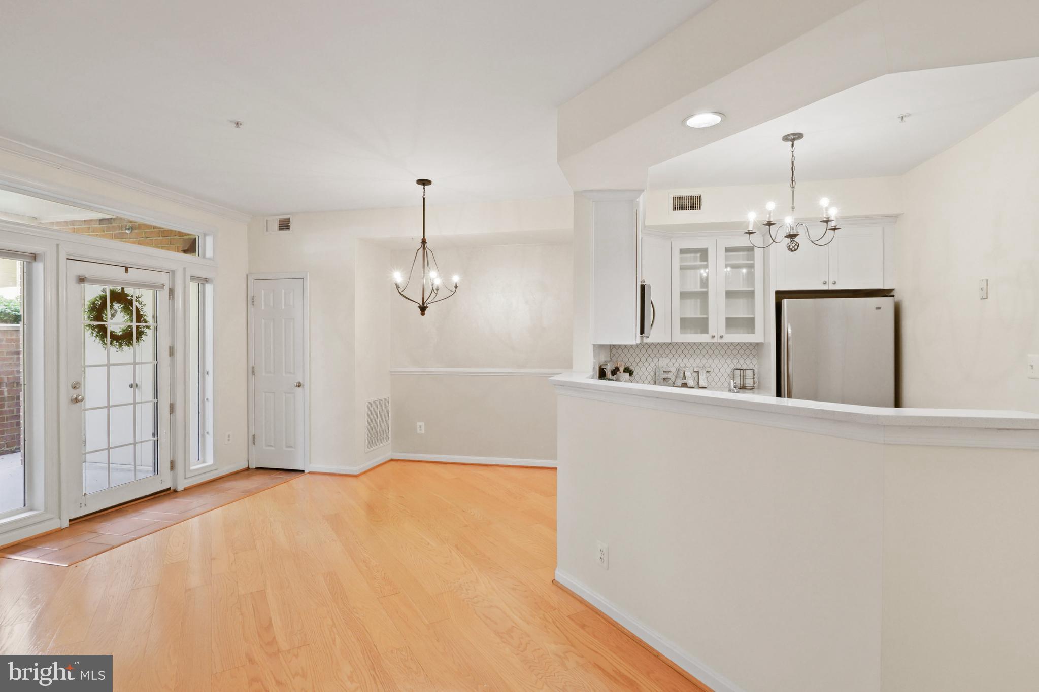 11313 Sundial Court, Unit 208 Reston, VA 20194 - Photo 17 of 30 Hardwood flooring in main areas