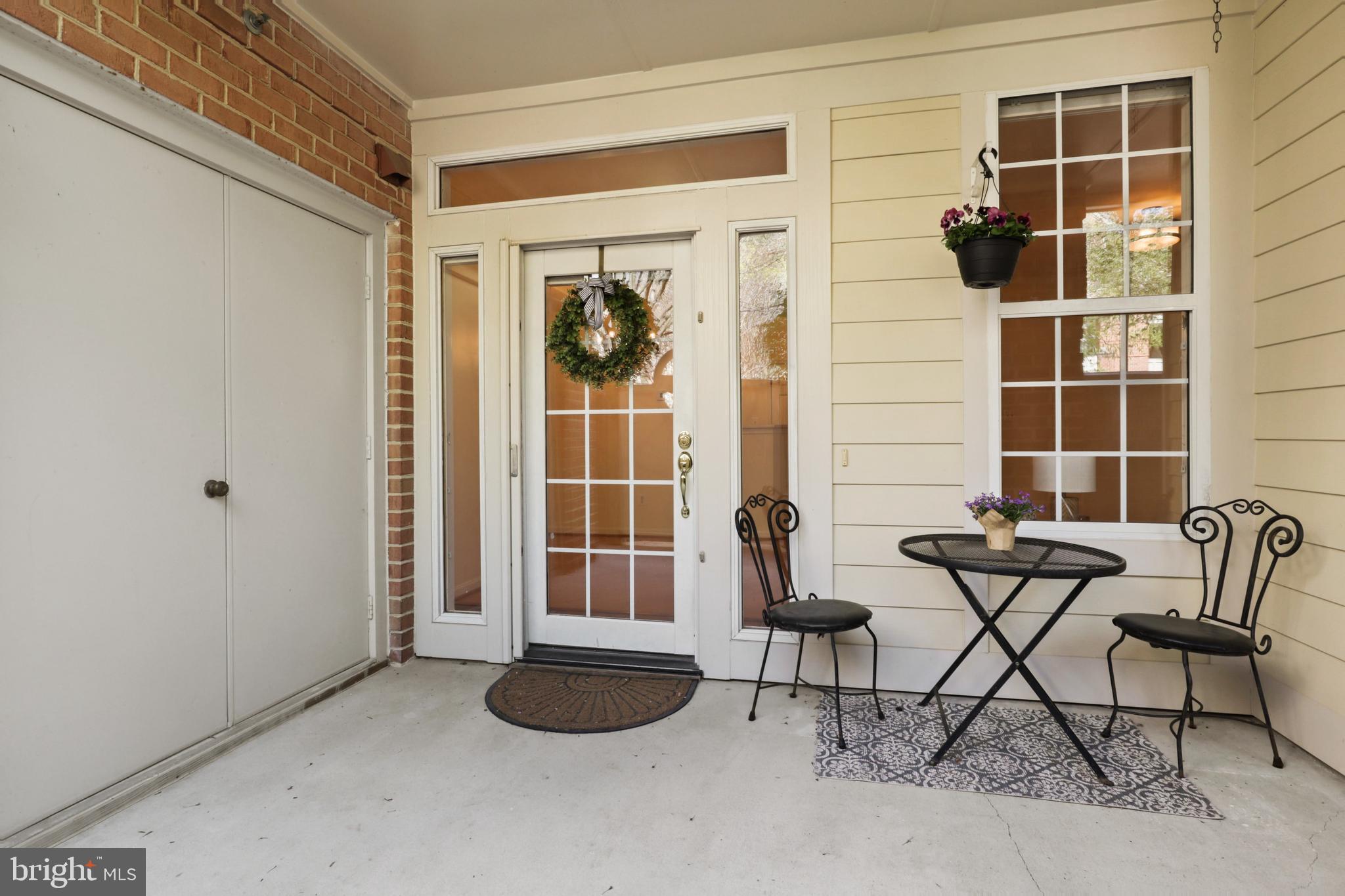11313 Sundial Court, Unit 208 Reston, VA 20194 - Photo 5 of 30 Spacious private patio with two front doors!