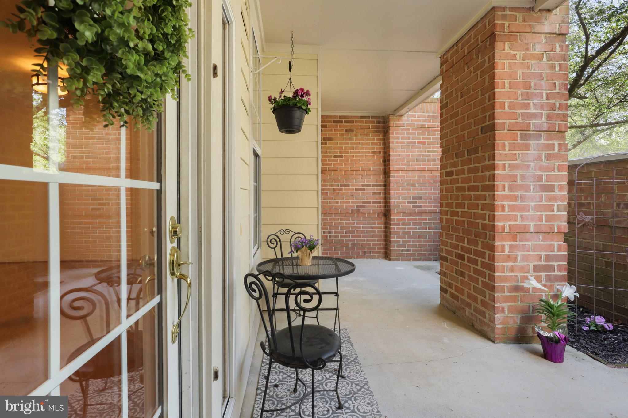 11313 Sundial Court, Unit 208 Reston, VA 20194 - Photo 6 of 30 Little garden area with room for dining/seating