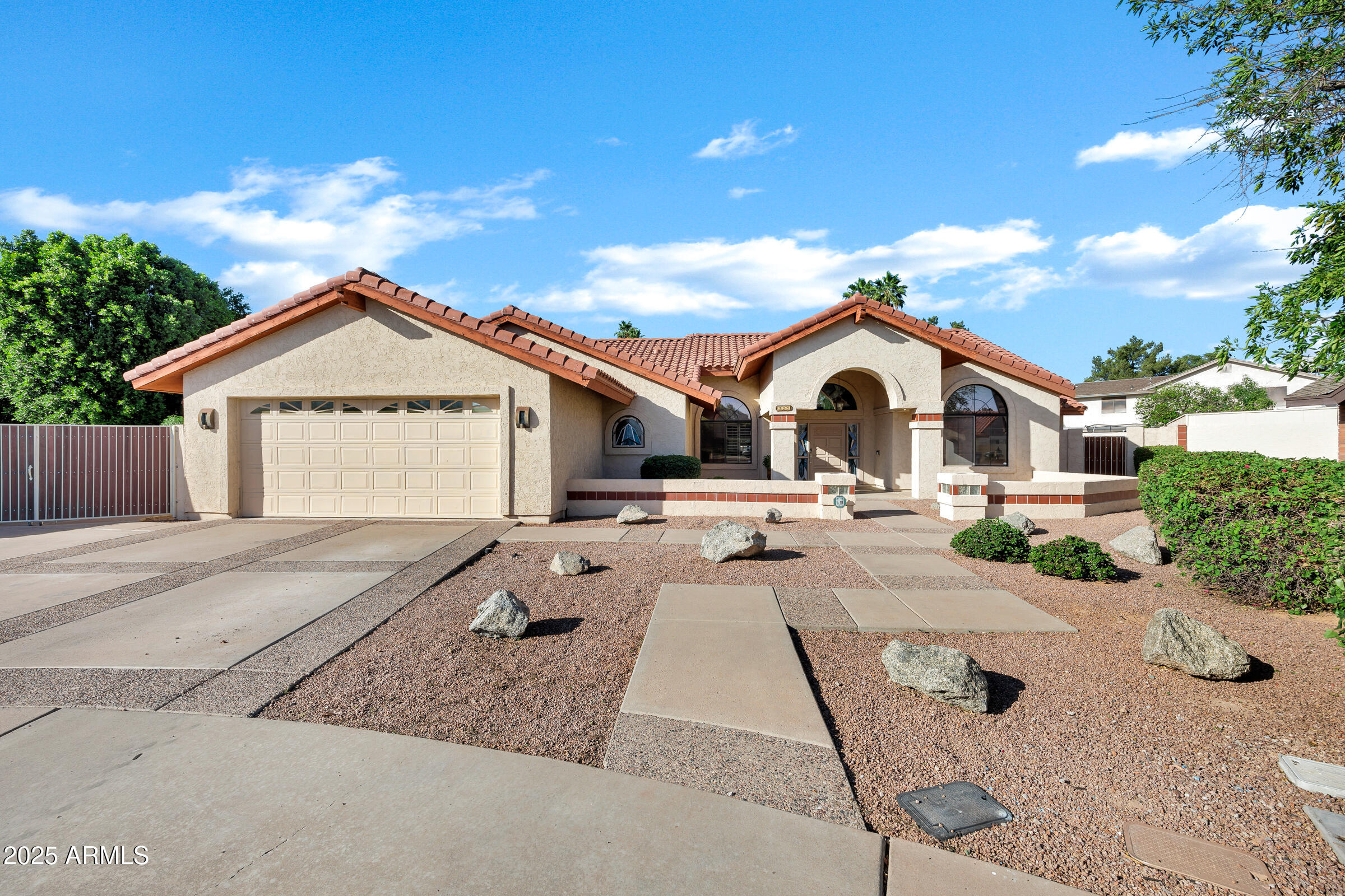 322 East Gary Circle Mesa, AZ 85201 - Photo 2 of 48 a view of a house with backyard and a tree