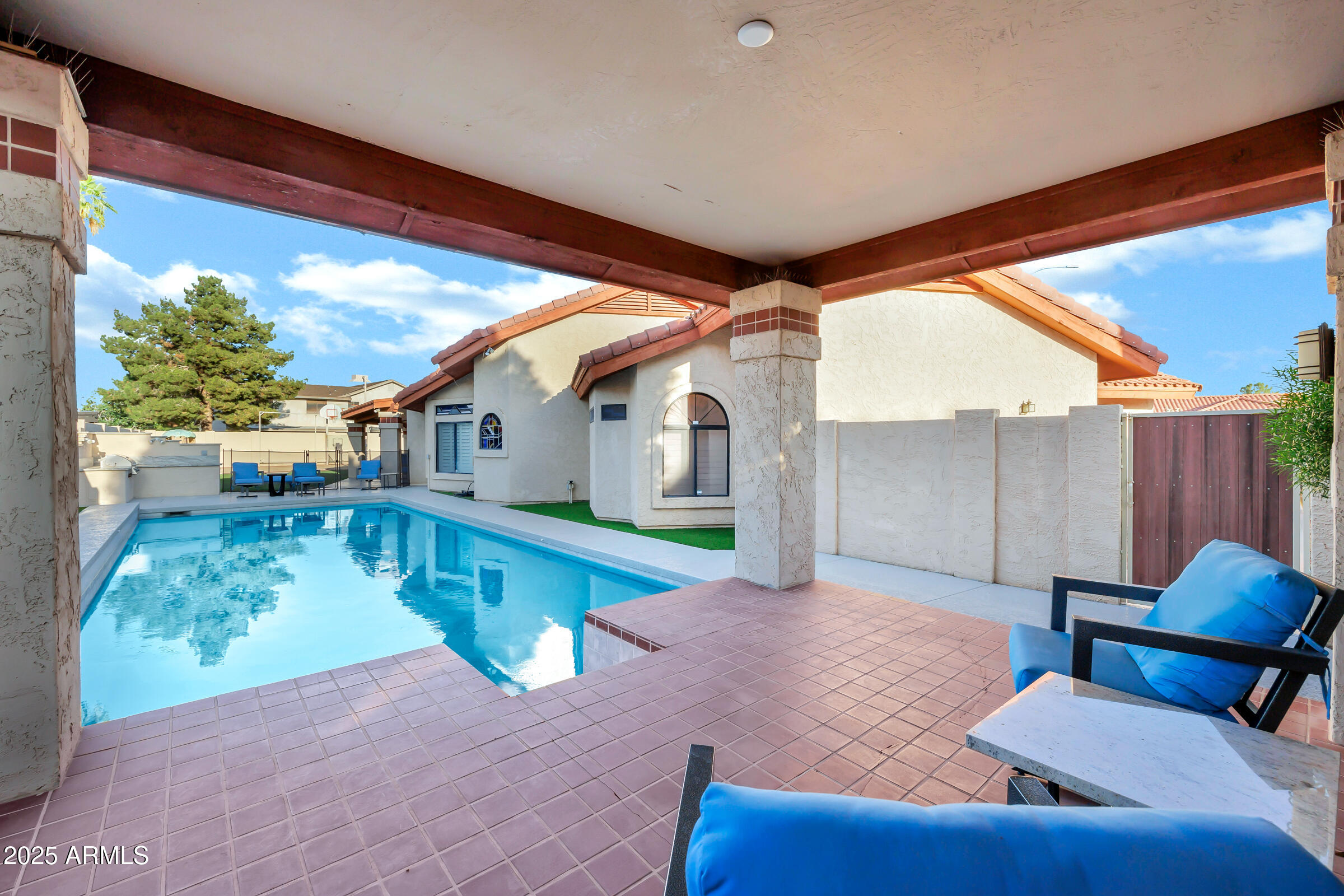 322 East Gary Circle Mesa, AZ 85201 - Photo 45 of 48 a porch with a table and chairs