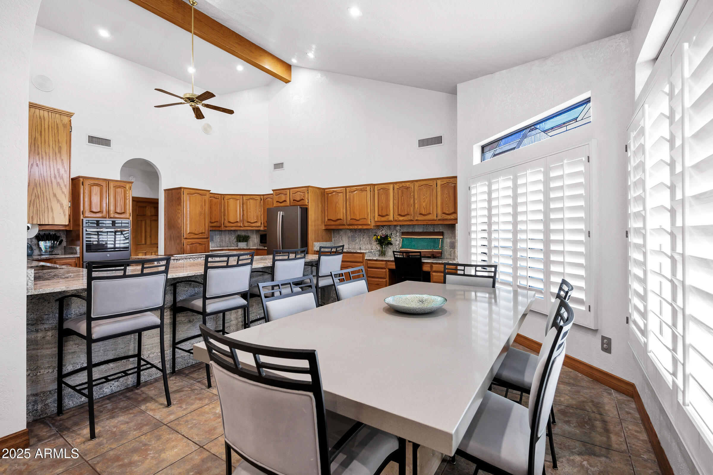 322 East Gary Circle Mesa, AZ 85201 - Photo 10 of 48 a kitchen with a table chairs and window