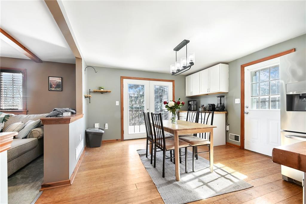 298 Sunset Road Pittsburgh, PA 15237 - Photo 6 of 24 a view of a dining room with furniture window and wooden floor