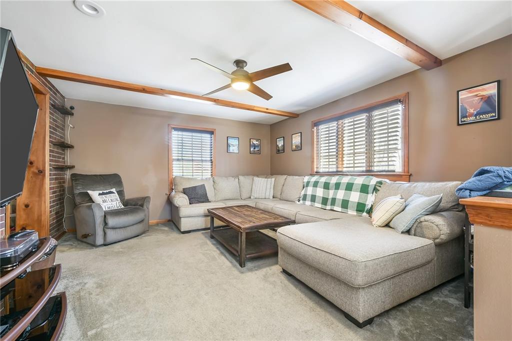298 Sunset Road Pittsburgh, PA 15237 - Photo 8 of 24 a living room with furniture and a large window