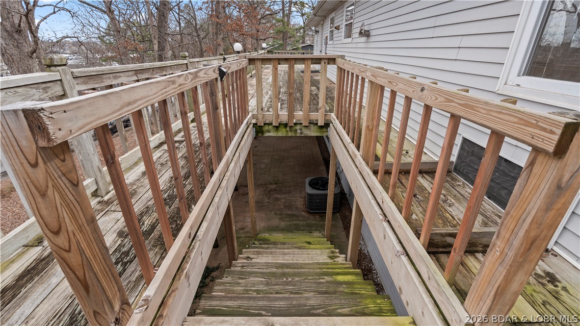 862 Malibu Road Osage Beach, MO 65065 - Photo 48 of 62 Large Wrap Around deck leading to lower level cove