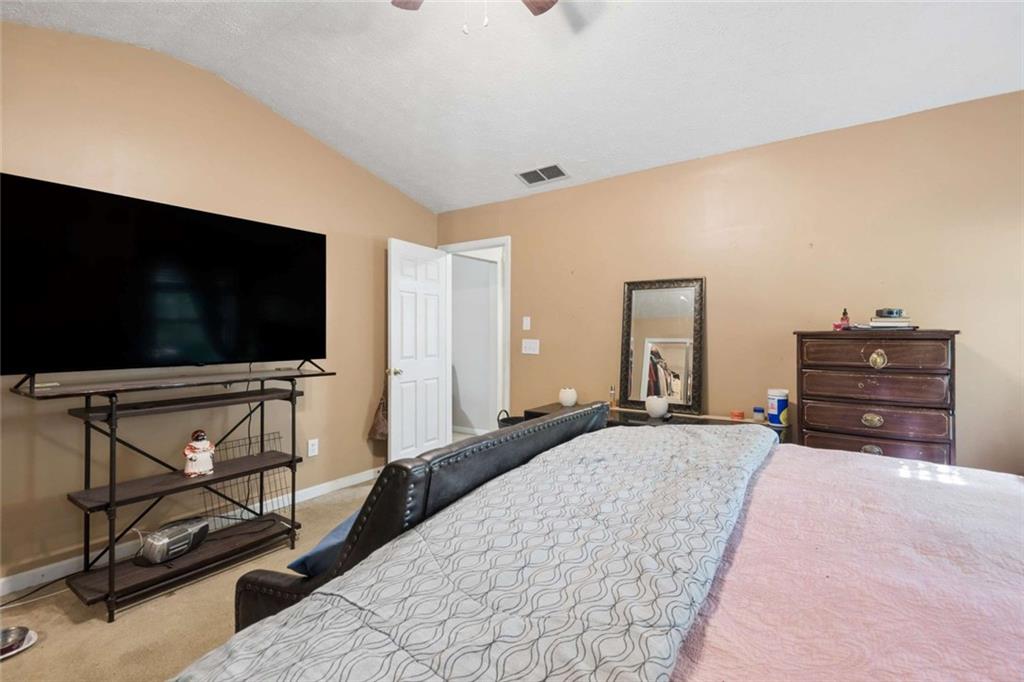 4220 Arrowhead Pointe Austell, GA 30106 - Photo 11 of 20 a living room with furniture and a flat screen tv