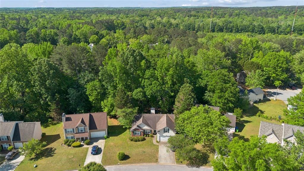 4220 Arrowhead Pointe Austell, GA 30106 - Photo 19 of 20 an aerial view of residential house with outdoor space and trees all around