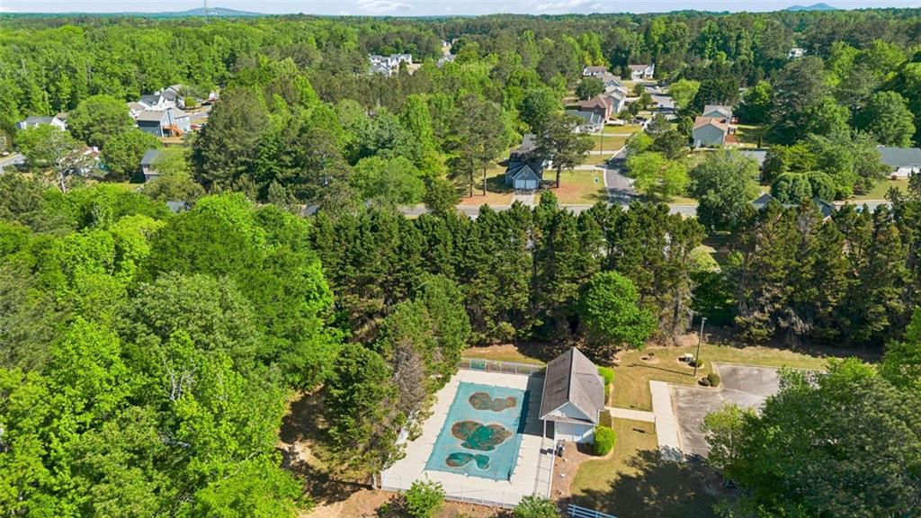 4220 Arrowhead Pointe Austell, GA 30106 - Photo 20 of 20 an aerial view of residential house with outdoor space and trees all around