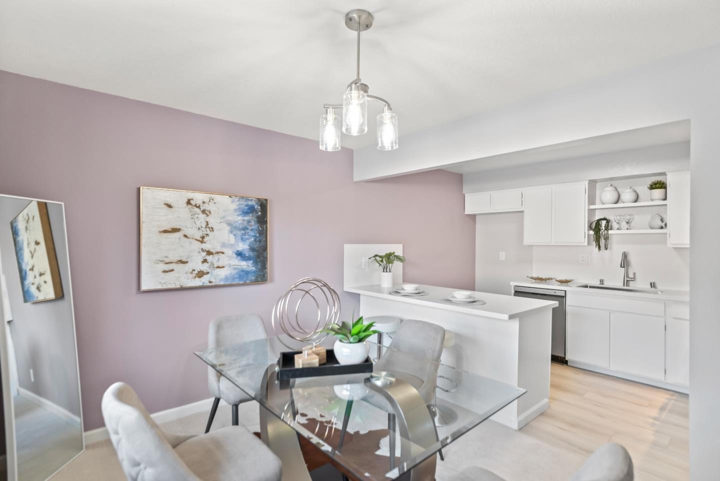 46867 Fernald Common Fremont, CA 94539 - Photo 7 of 23 a dining room with furniture and chandelier