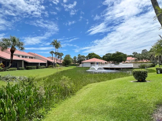 a view of a garden with houses