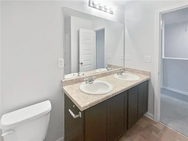 a bathroom with a sink and a toilet