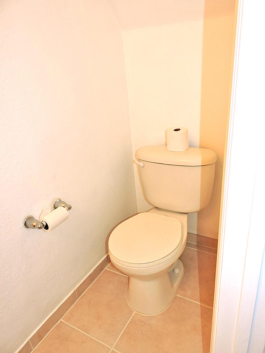 1986 Alamanda Way Riviera Beach, FL 33404 - Photo 16 of 49 a bathroom with a toilet and a shower