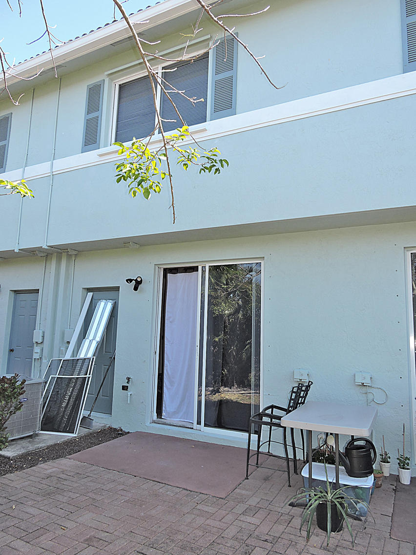 1986 Alamanda Way Riviera Beach, FL 33404 - Photo 24 of 49 a view of a room with furniture and toys