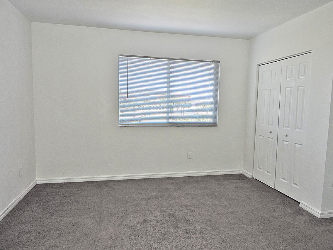 1986 Alamanda Way Riviera Beach, FL 33404 - Photo 30 of 49 an empty room with a window