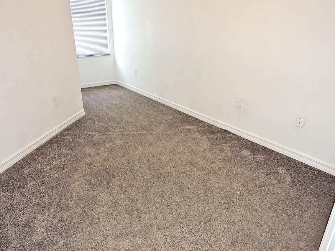 1986 Alamanda Way Riviera Beach, FL 33404 - Photo 42 of 49 an empty room with a bench