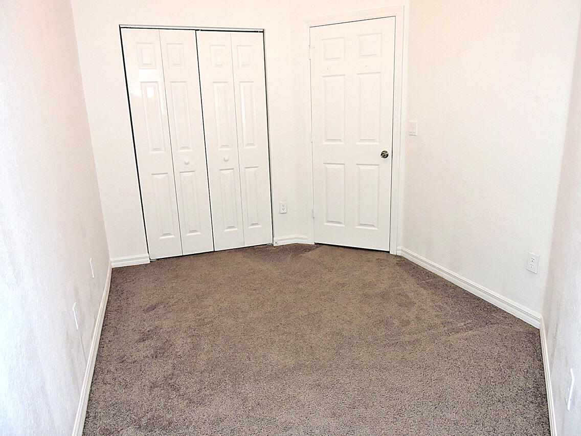 1986 Alamanda Way Riviera Beach, FL 33404 - Photo 44 of 49 a view of an empty room