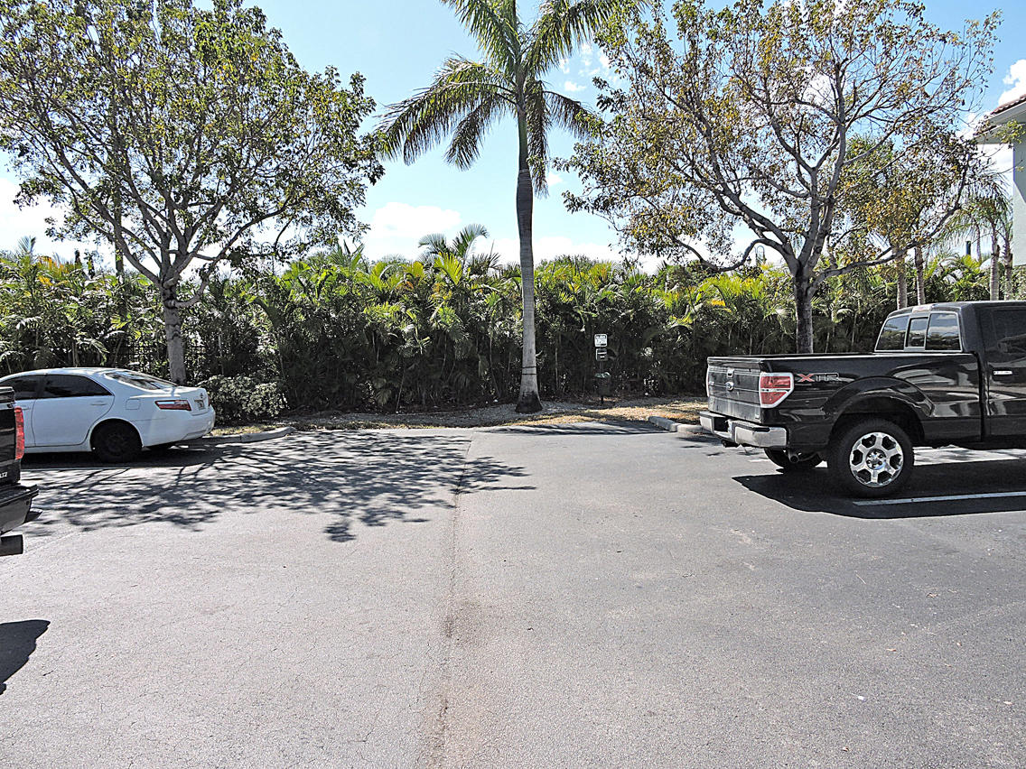 1986 Alamanda Way Riviera Beach, FL 33404 - Photo 48 of 49 a view of street with parked cars
