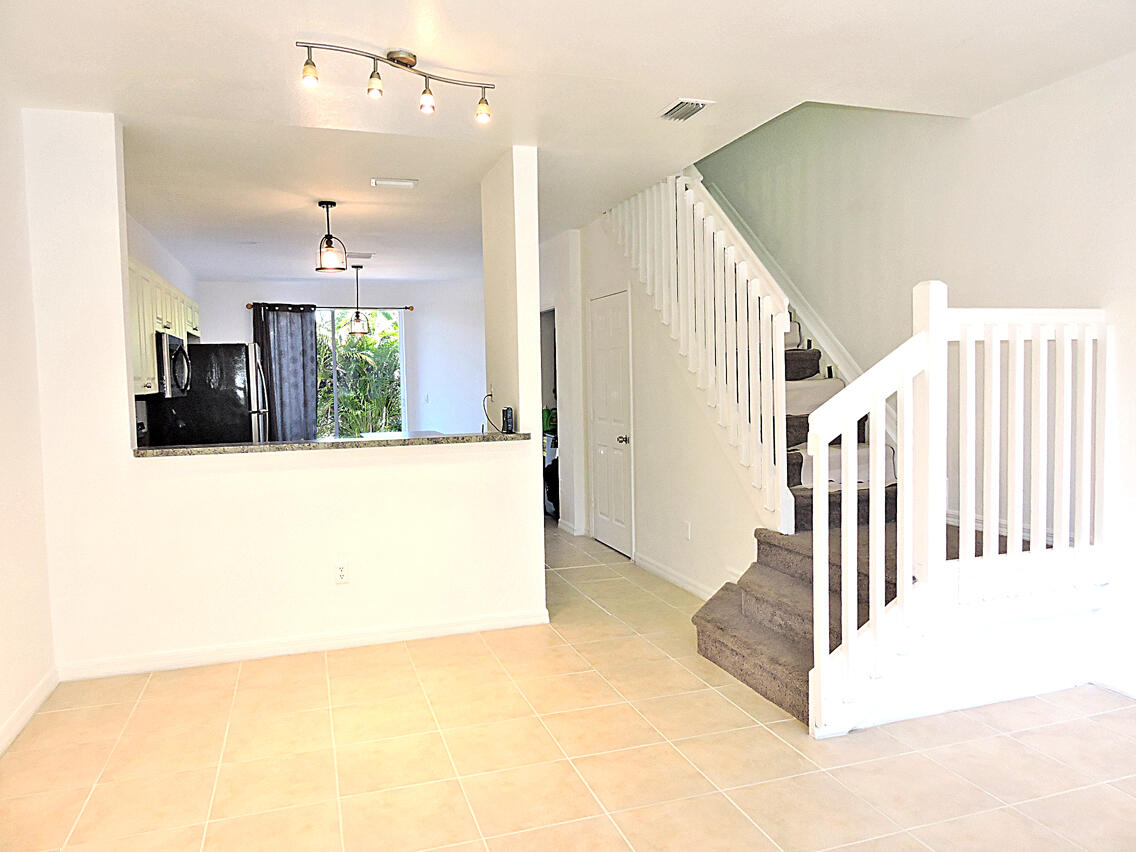 1986 Alamanda Way Riviera Beach, FL 33404 - Photo 5 of 49 a view of a kitchen with kitchen and a window