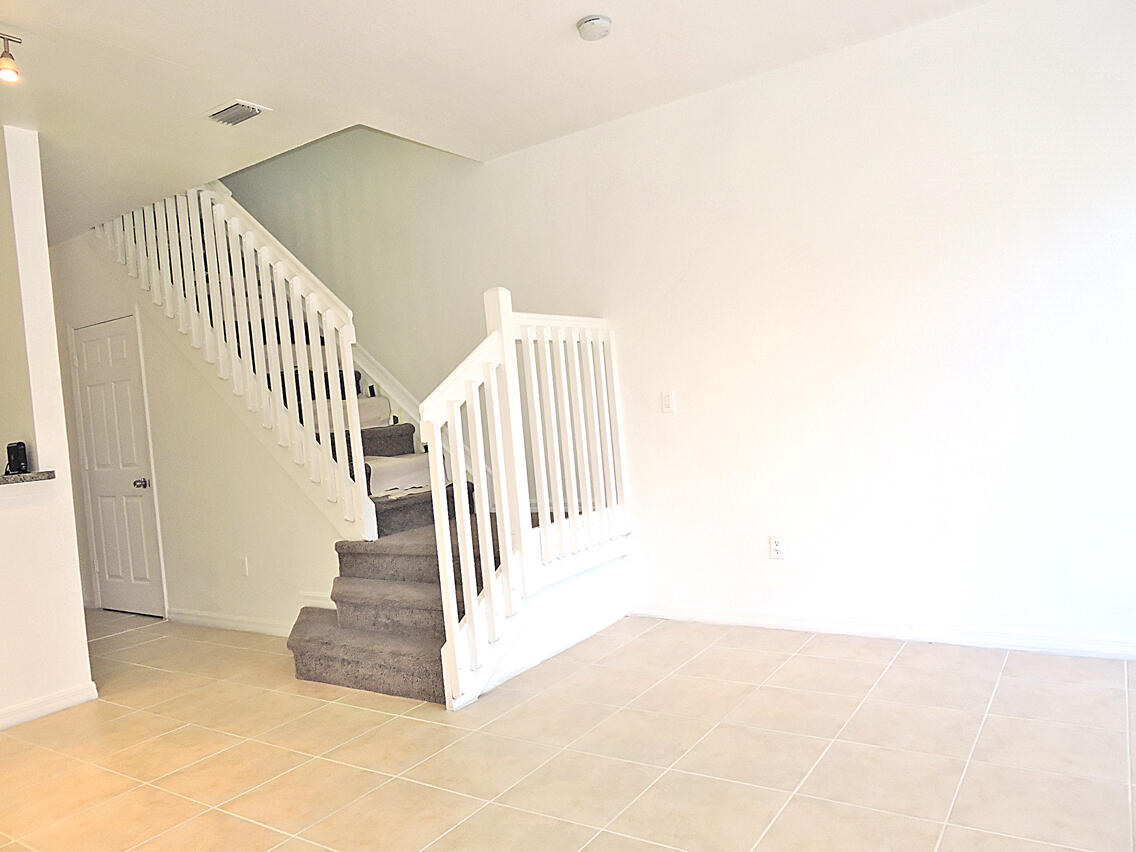 1986 Alamanda Way Riviera Beach, FL 33404 - Photo 6 of 49 a view of entryway and hall