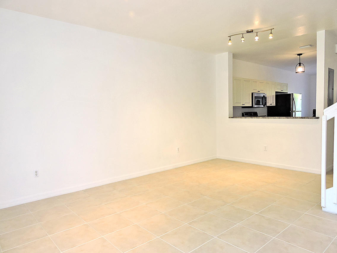 1986 Alamanda Way Riviera Beach, FL 33404 - Photo 7 of 49 a view of a room with a kitchen