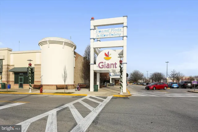 a view of a street with cars on the road