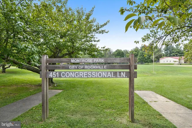 a view of a park with welcome board