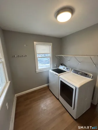 a utility room with washer and dryer