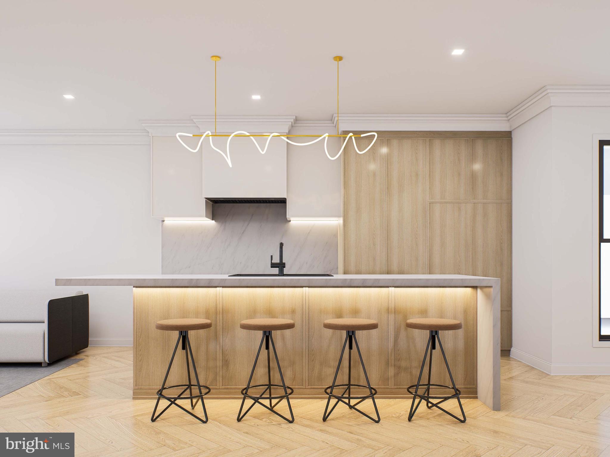a kitchen with a table chairs and a wooden floor