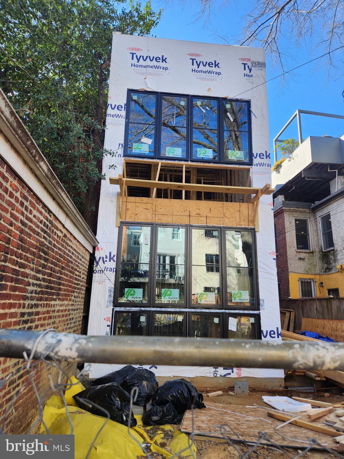 1415 Q Street Northwest, Unit 3 Washington, DC 20009 - Photo 3 of 5 a view of a building with large windows