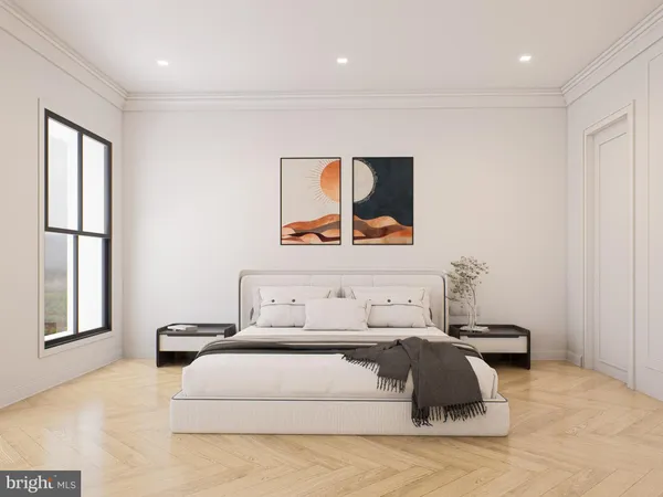 a bedroom with a bed and a large window