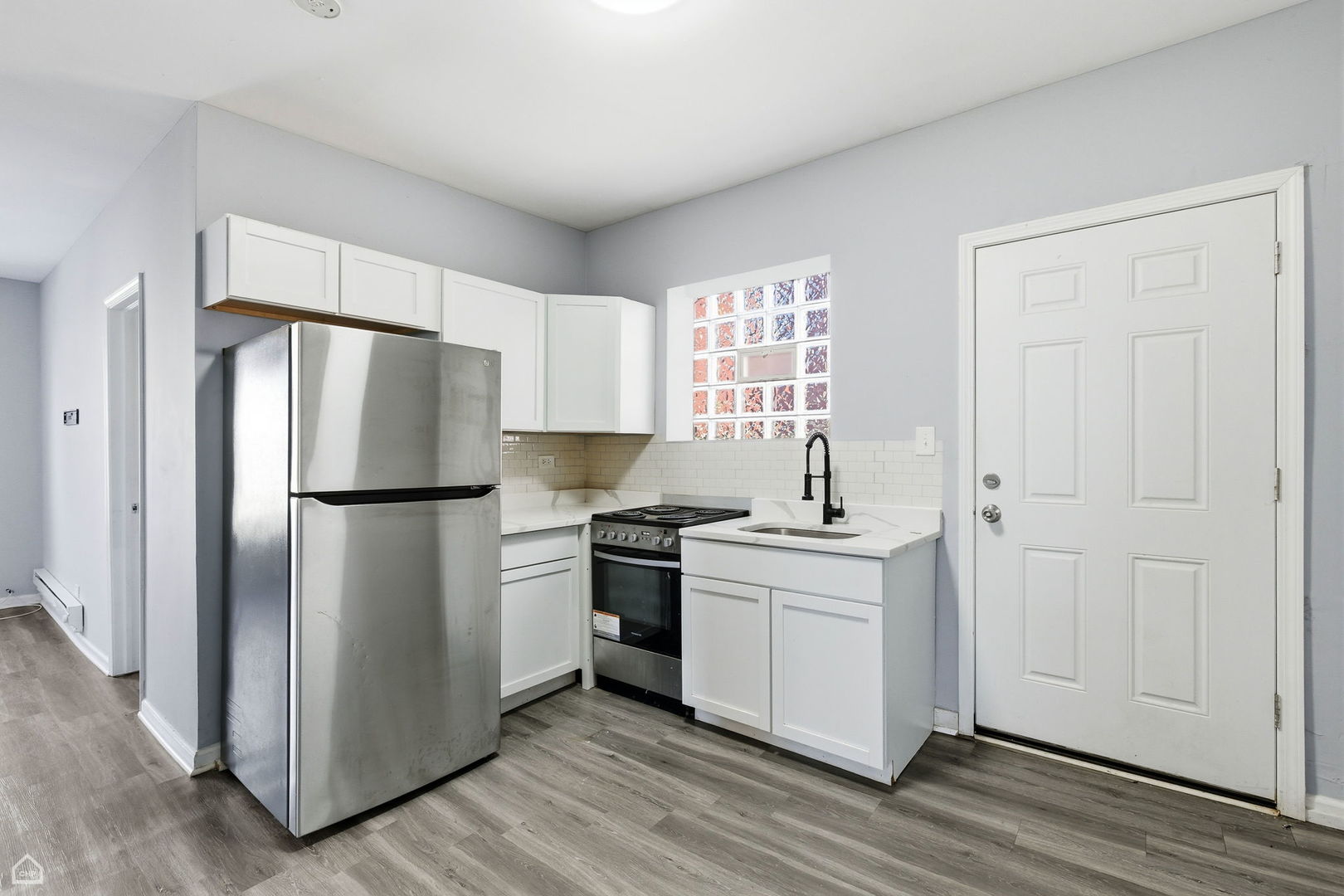 16 East 118th Place, Unit 1F Chicago, IL 60628 - Photo 3 of 14