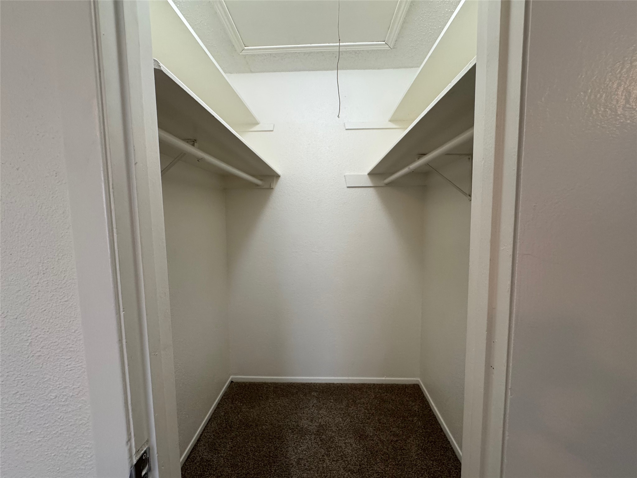 4810 West Wind Trail, Unit 104 Austin, TX 78745 - Photo 17 of 21 a view of walk in closet