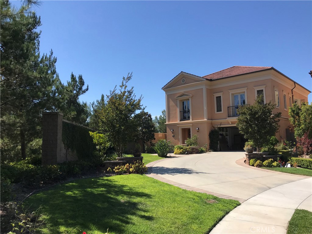 51 Domani Irvine, CA 92618 - Photo 3 of 9 a view of house with yard and green space
