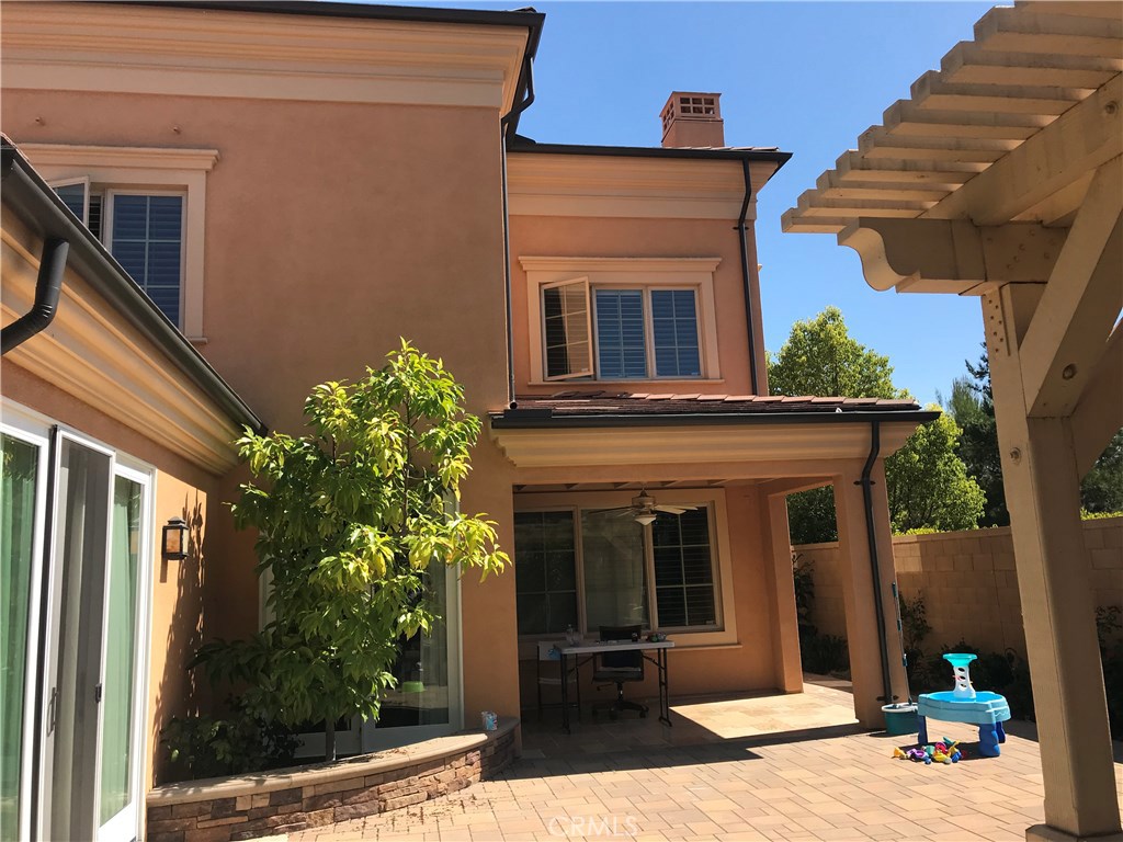 51 Domani Irvine, CA 92618 - Photo 9 of 9 a front view of a house with garden