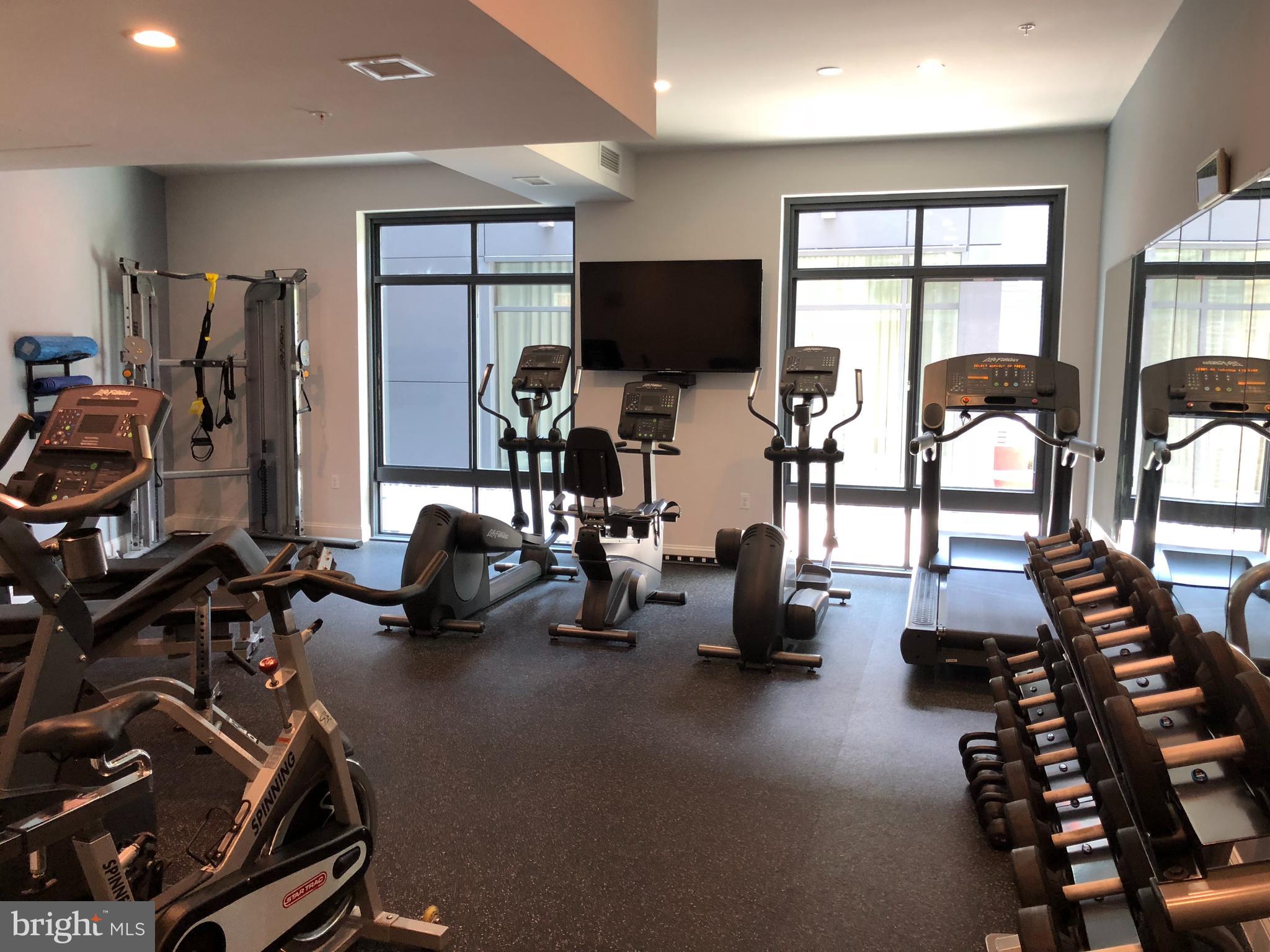 525 Water Street Southwest, Unit 308 Washington, DC 20024 - Photo 22 of 24 a view of a room with gym equipment
