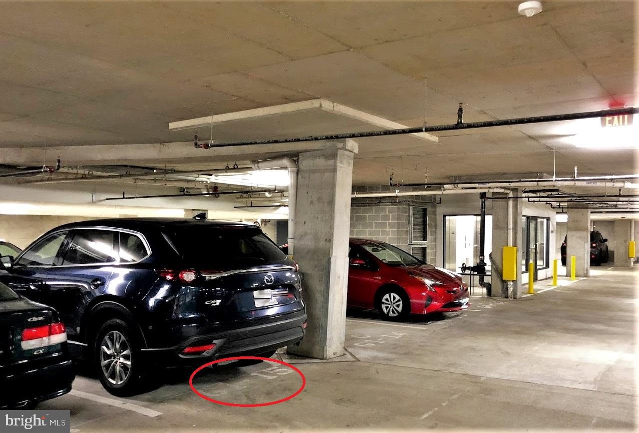 525 Water Street Southwest, Unit 308 Washington, DC 20024 - Photo 24 of 24 a car parked in a parking garage