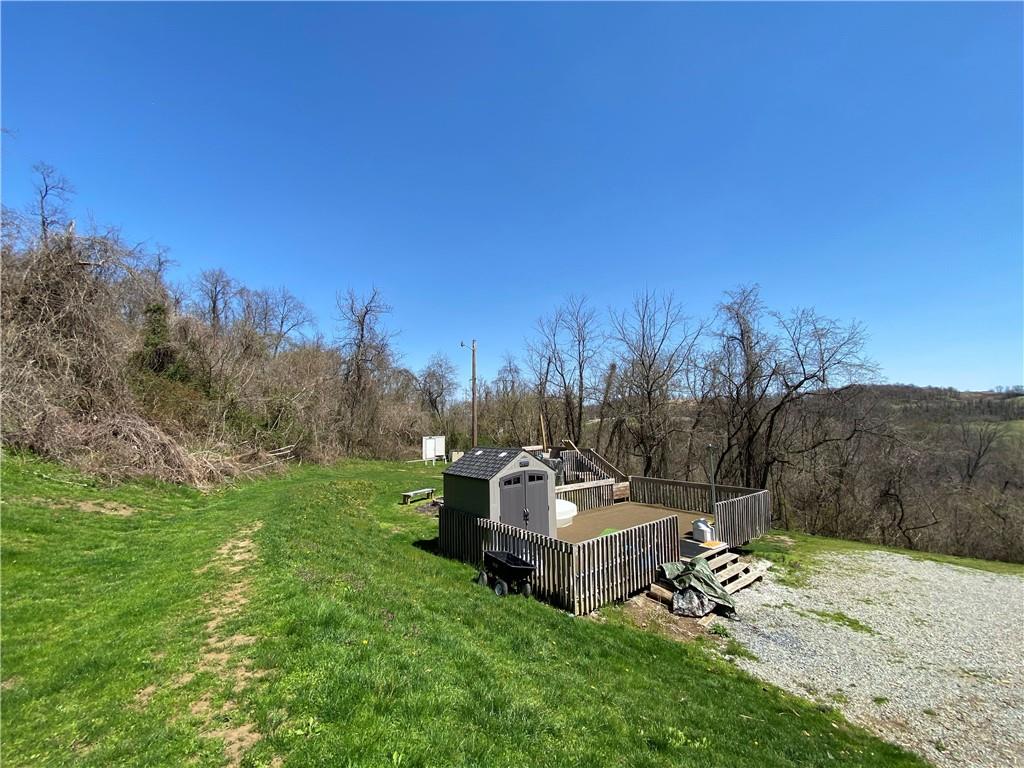 455 Havers Hill Road Jefferson, PA 15344 - Photo 8 of 15 a view of a house with a yard and sitting area