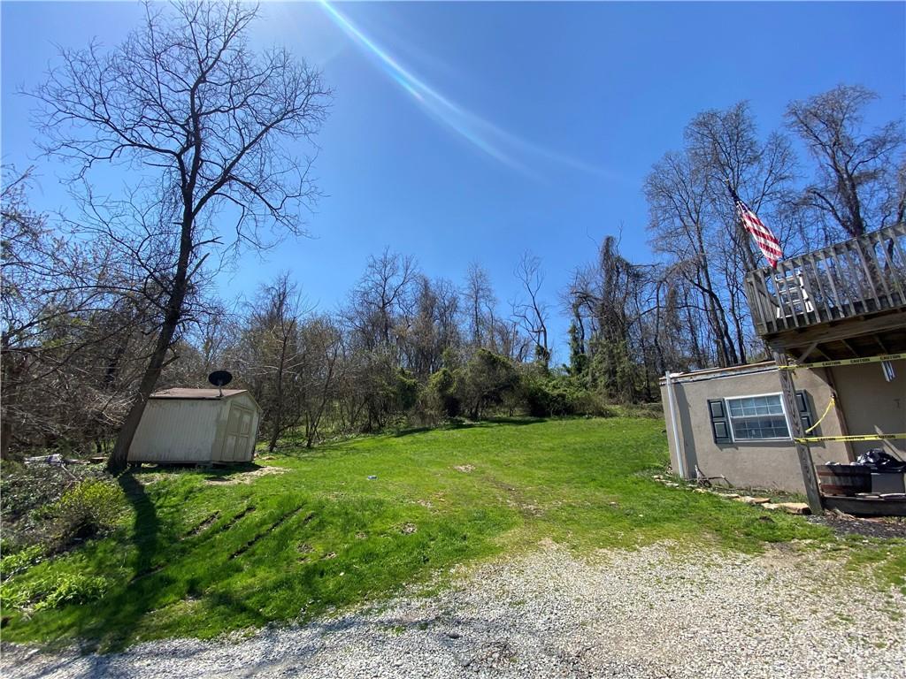 455 Havers Hill Road Jefferson, PA 15344 - Photo 9 of 15 a view of a backyard with trees