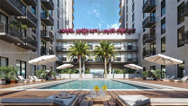 a front view of building with yard