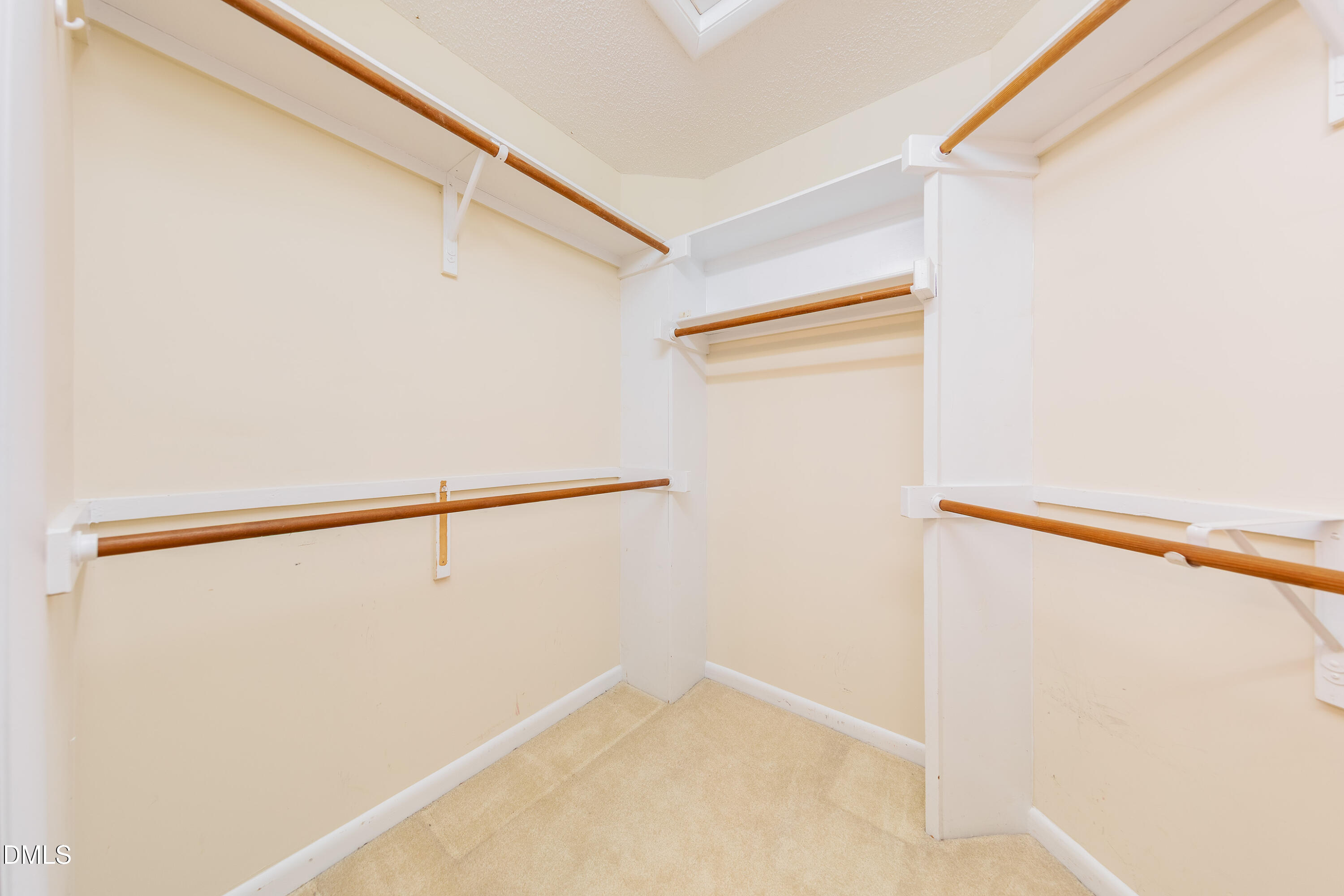 7918 Wood Cove Court Raleigh, NC 27615 - Photo 20 of 31 a view of small space with racks on the wall