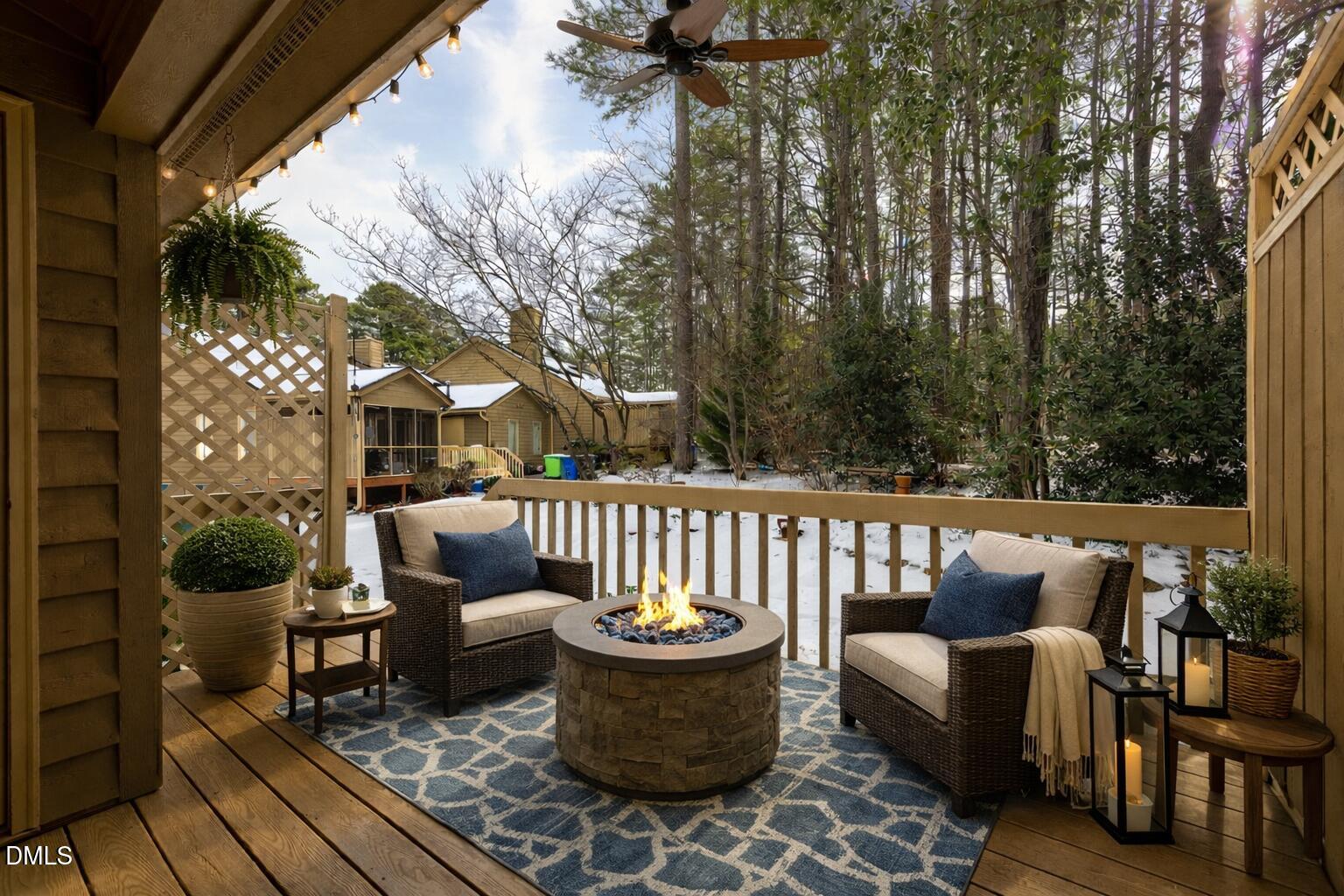 7918 Wood Cove Court Raleigh, NC 27615 - Photo 27 of 31 a view of balcony with wooden floor and outdoor seating