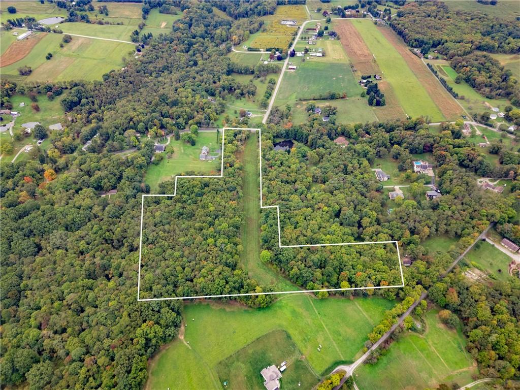 0 North Reiber Road Renfrew, PA 16053 - Photo 20 of 28 a view of a back yard of the house and front view of a house