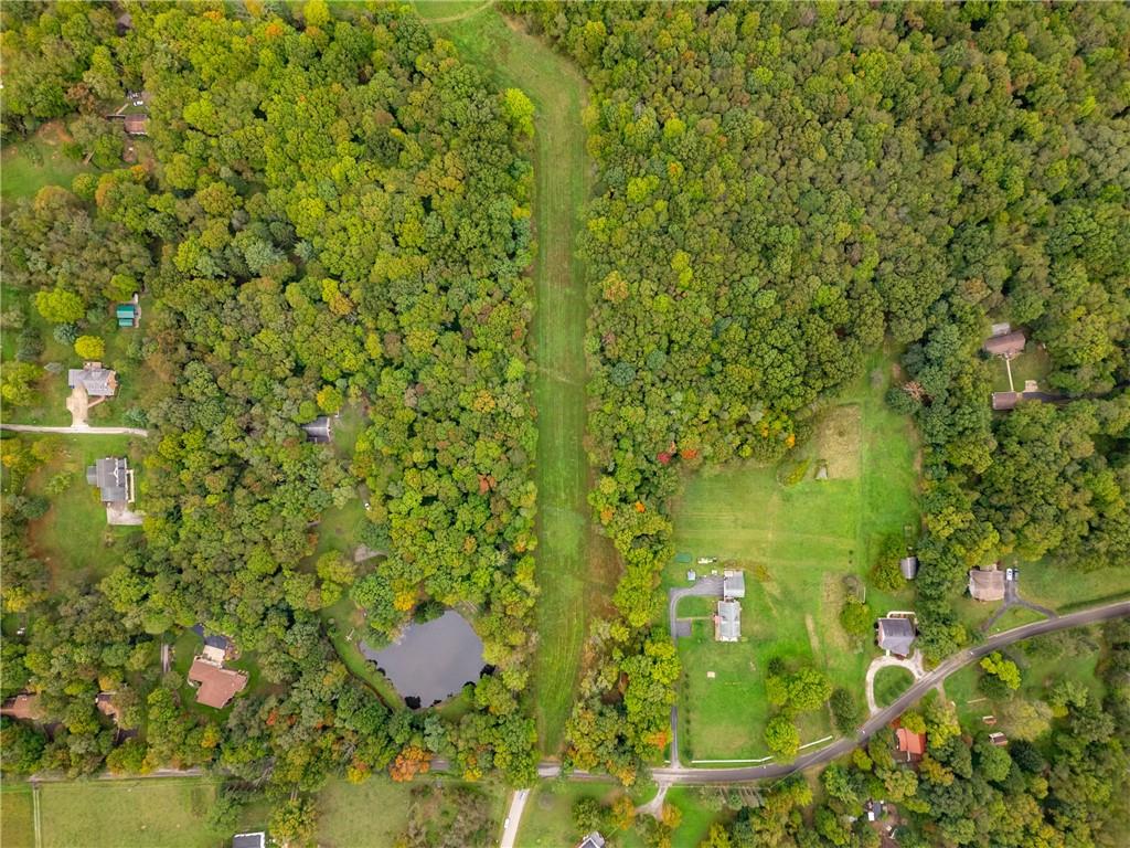 0 North Reiber Road Renfrew, PA 16053 - Photo 4 of 28 a bathroom with a small yard and green space