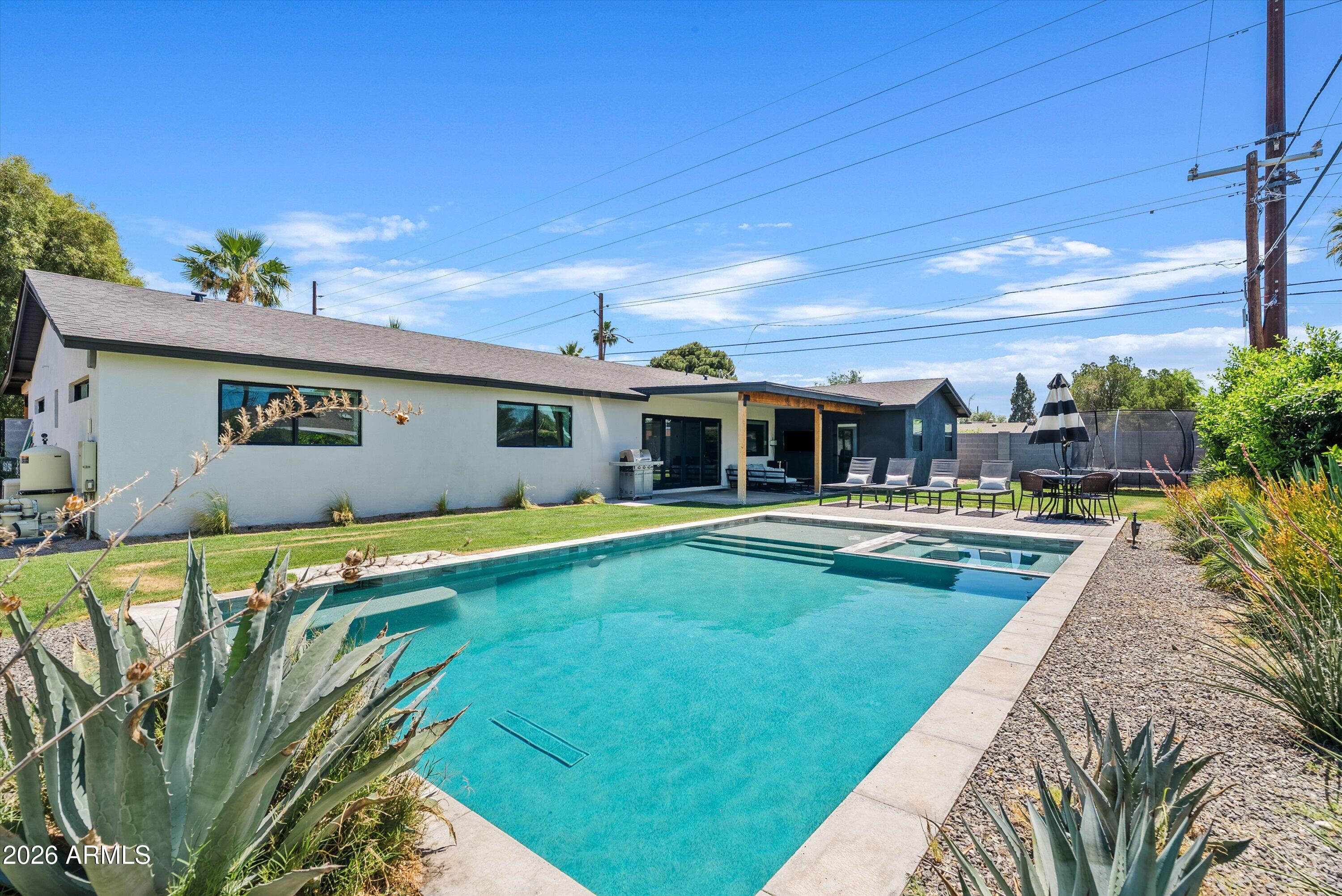 6706 North 12th Way Phoenix, AZ 85014 - Photo 36 of 39 a view of swimming pool with seating space
