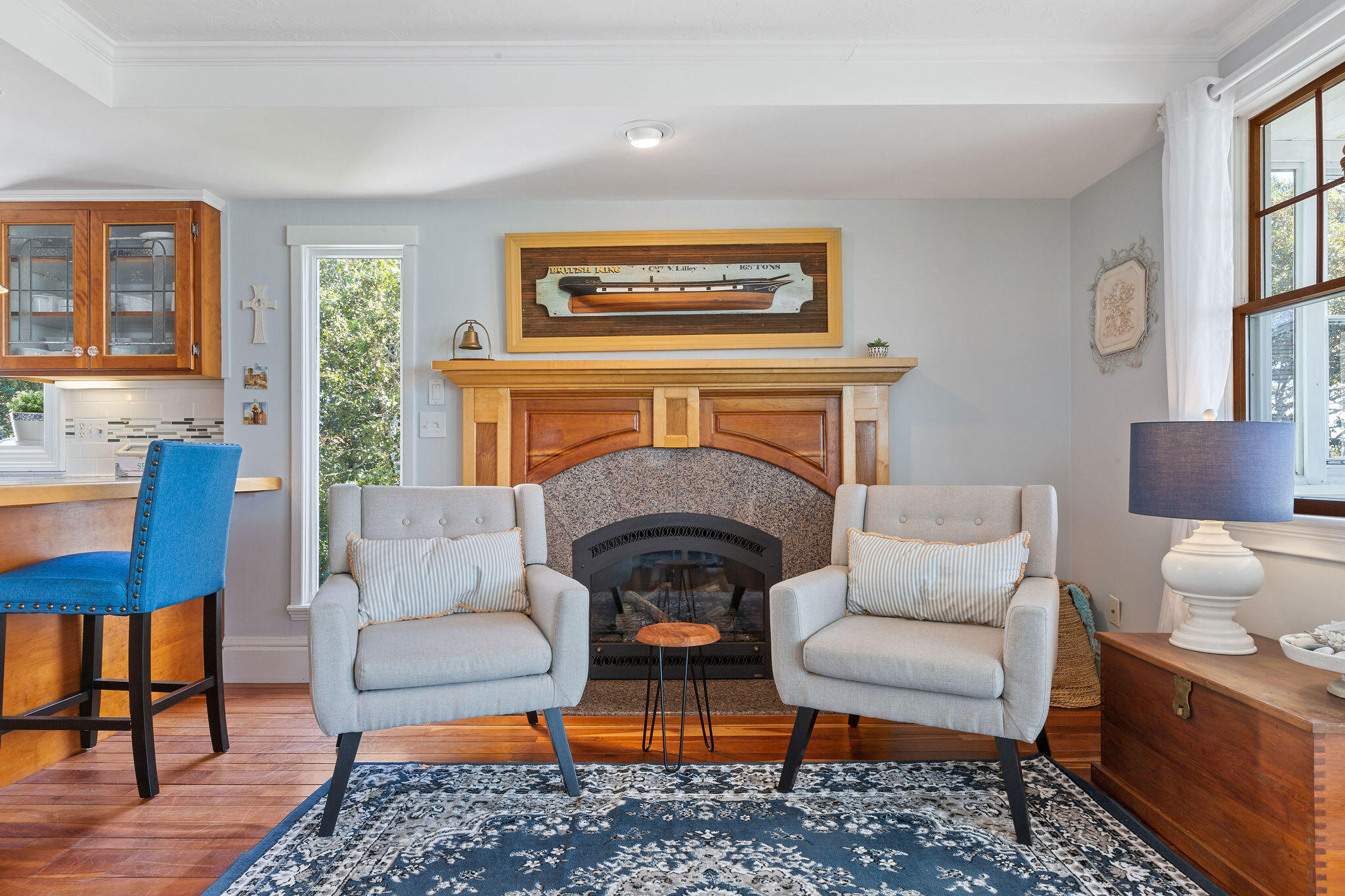 80 Mattakese Road, Unit 7 West Yarmouth, MA 02673 - Photo 15 of 38 a living room with furniture and a fireplace