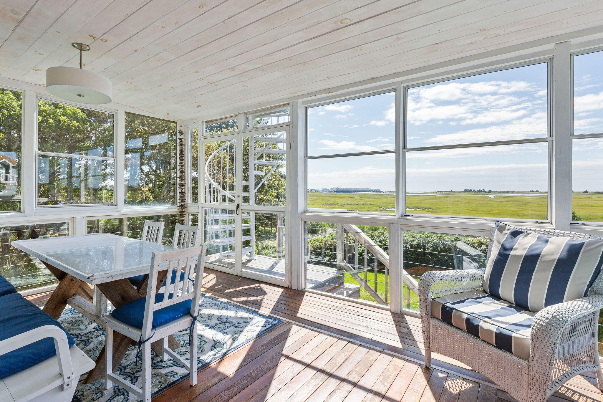 80 Mattakese Road, Unit 7 West Yarmouth, MA 02673 - Photo 19 of 38 a view of a dining room with furniture window and outside view