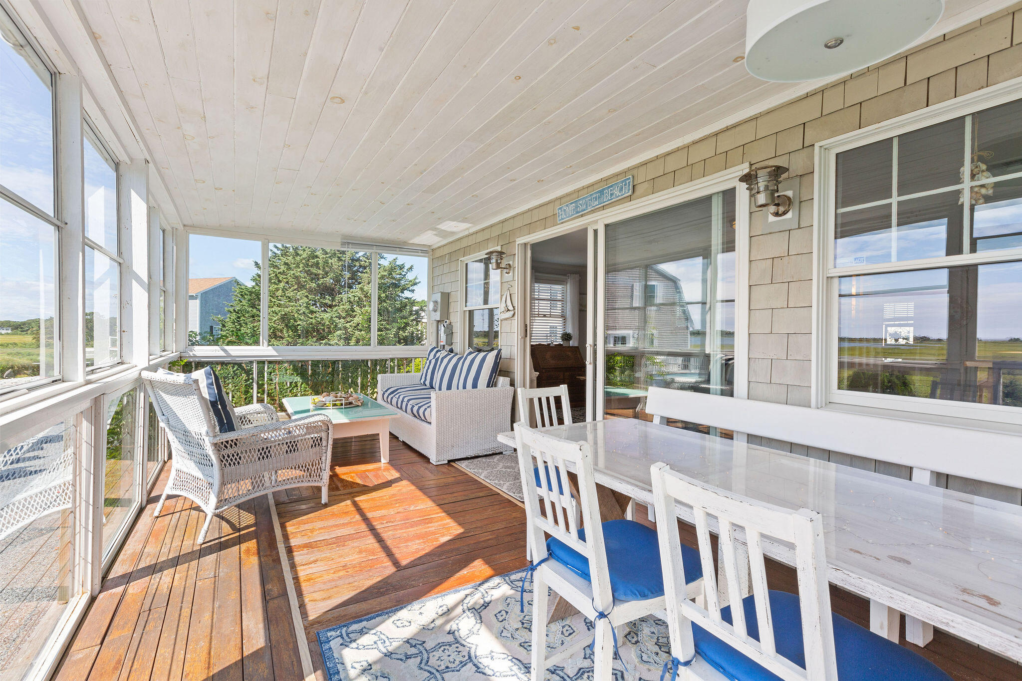 80 Mattakese Road, Unit 7 West Yarmouth, MA 02673 - Photo 20 of 38 a living room with furniture and a large window
