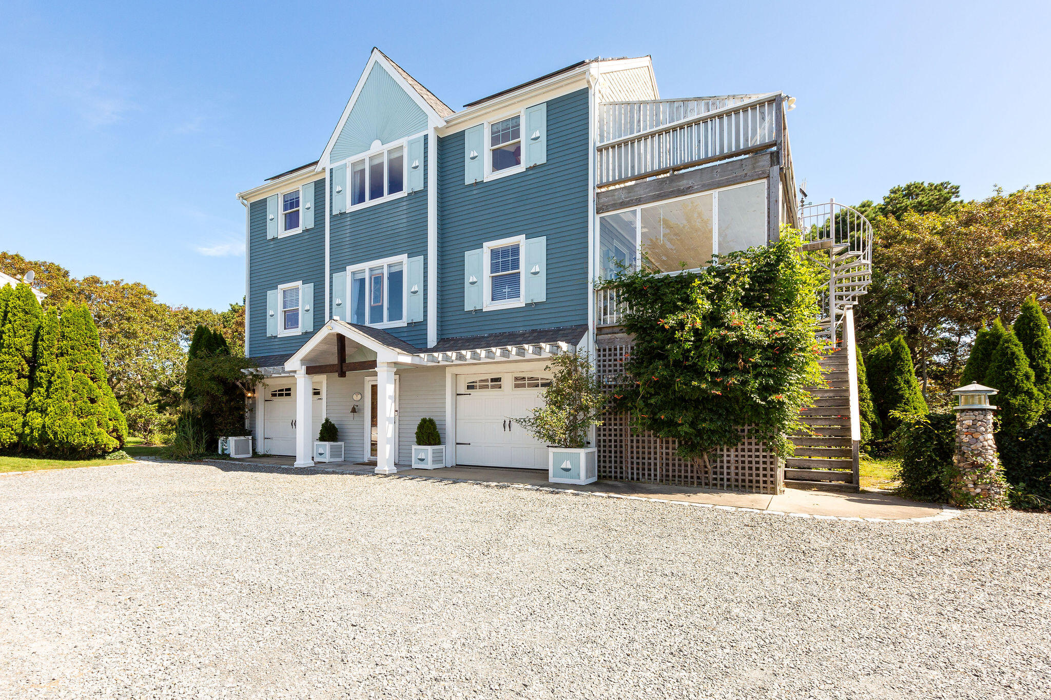 80 Mattakese Road, Unit 7 West Yarmouth, MA 02673 - Photo 3 of 38 a view of a building with a street