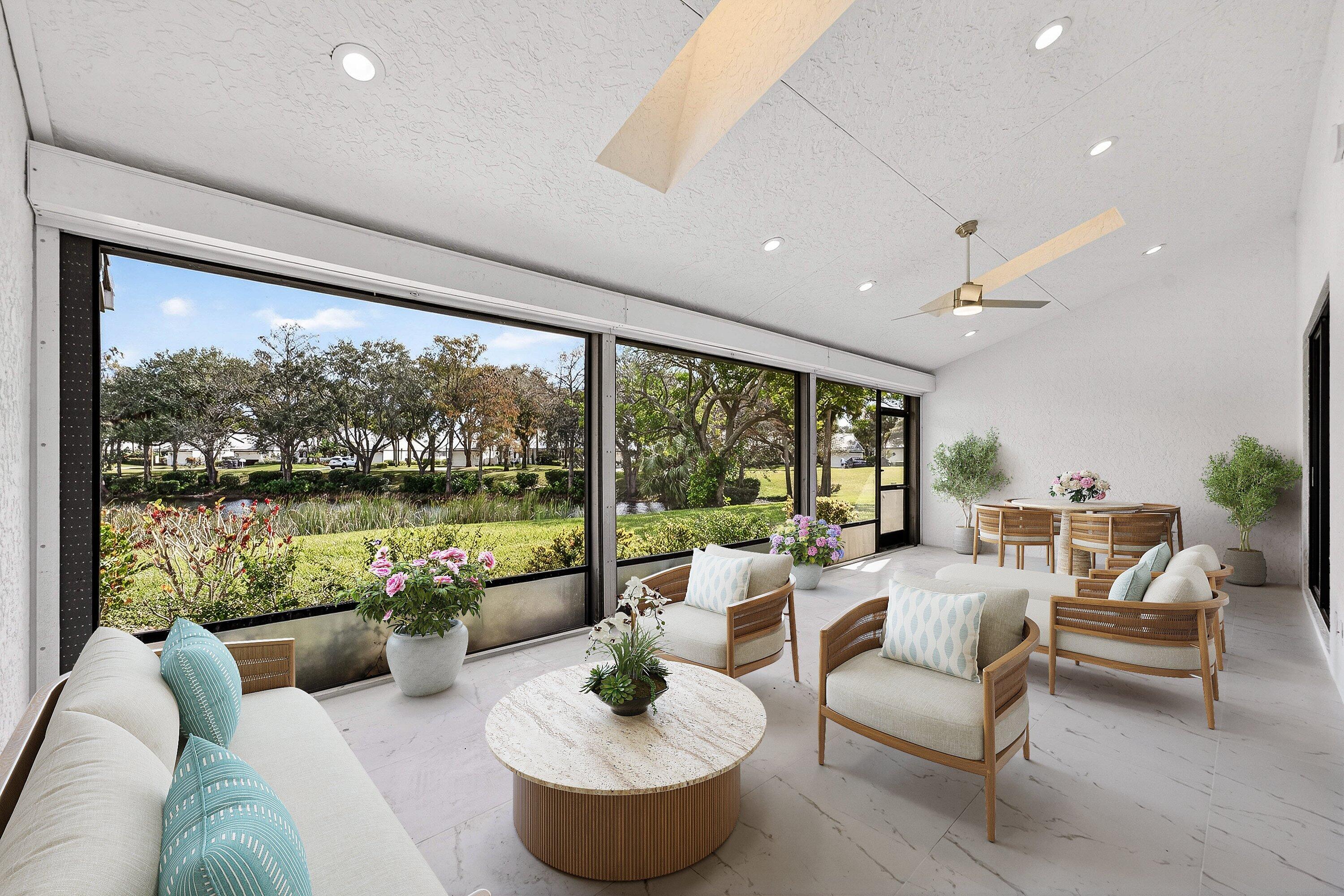6 Clubhouse Lane Boynton Beach, FL 33436 - Photo 12 of 76 a living room with patio furniture and a potted plants